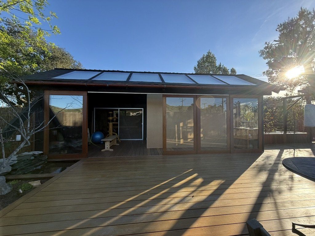 Dojo interior with Cumaru hardwood flooring and glass ceiling