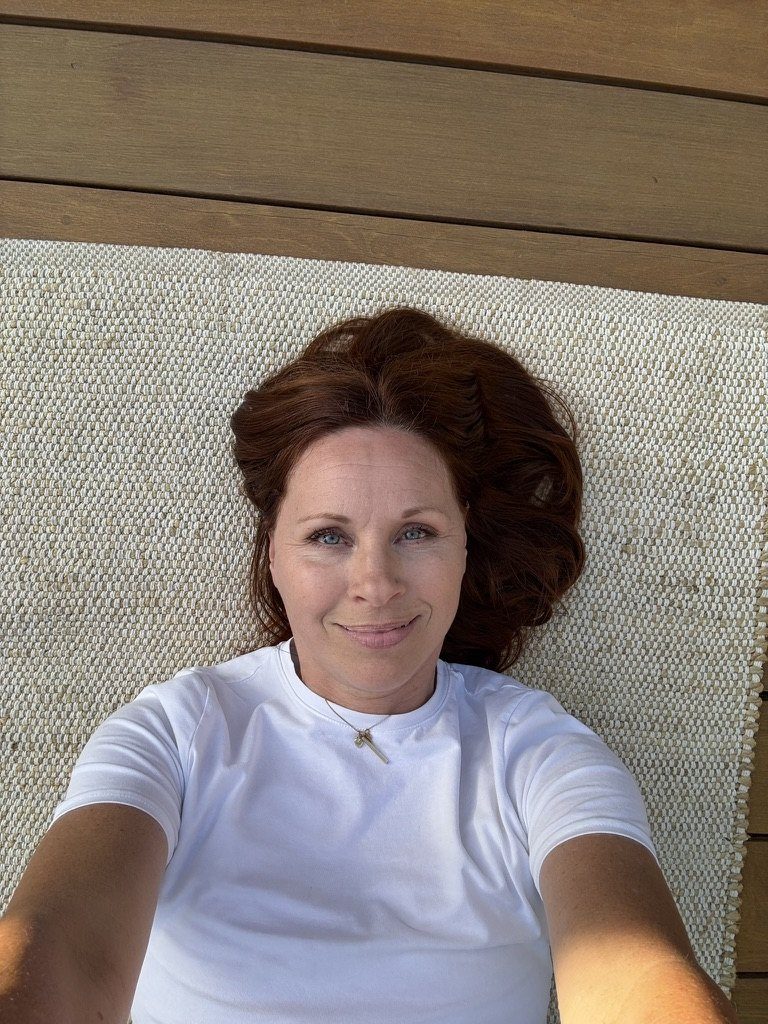Christina relaxing on the dojo deck